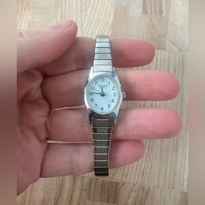 Sharp ladies oval silver tone dress watch NEW BATTERY